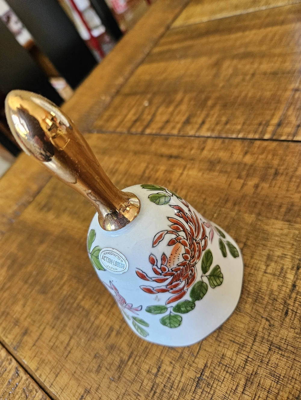 Vintage Action-Lobeco Japan. Hand-Painted Porcelain Bell with Gold Handle -